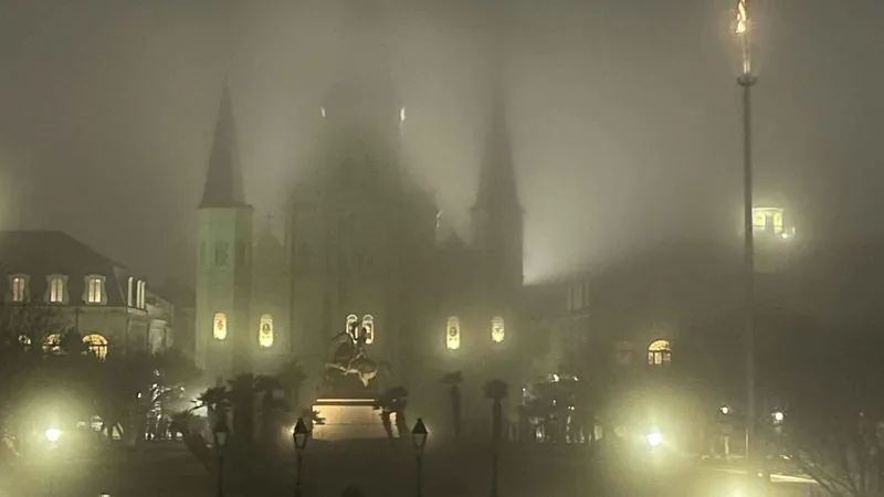 Guide telling ghost stories on a New Orleans French Quarter ghost tour at night, Louisiana