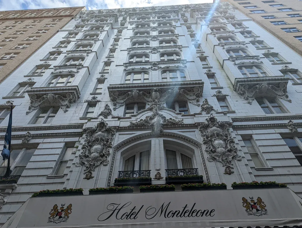 The ornate facade of Hotel Monteleone on Royal Street, one of the haunted hotels near New Orleans ghost tours