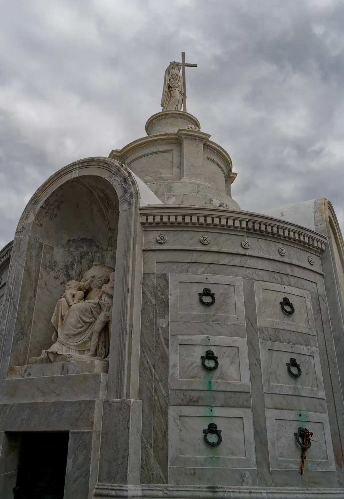 A society tomb with stacked vaults in St. Louis Cemetery No. 1, seen on the official cemetery tour in New Orleans